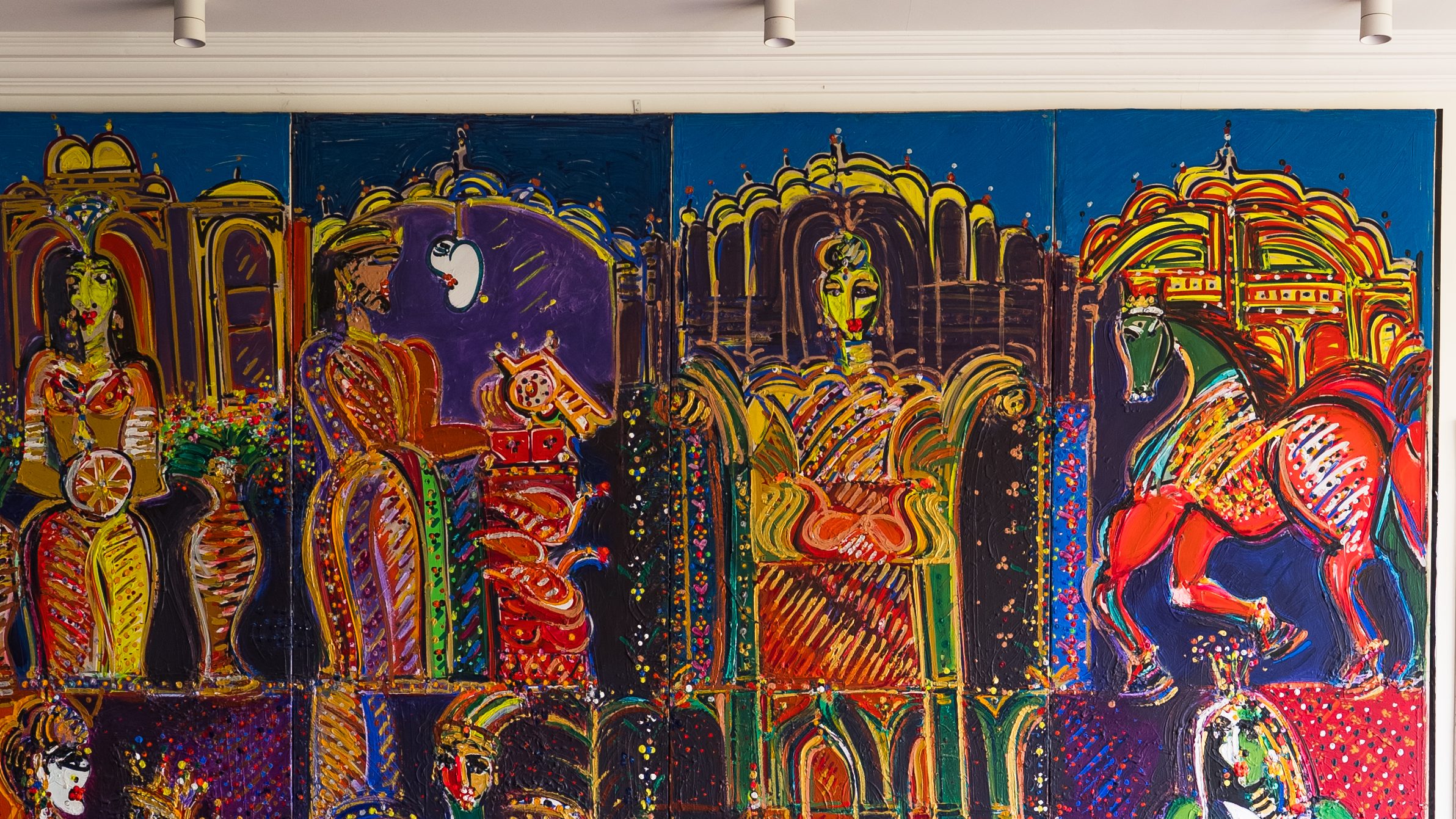Bedroom built around a four-panel painted mural