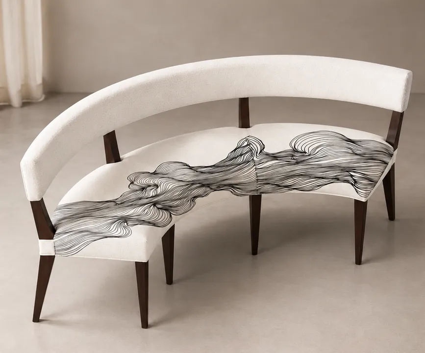 The Arc Bench, a curved bench with an artful upholstered seat
